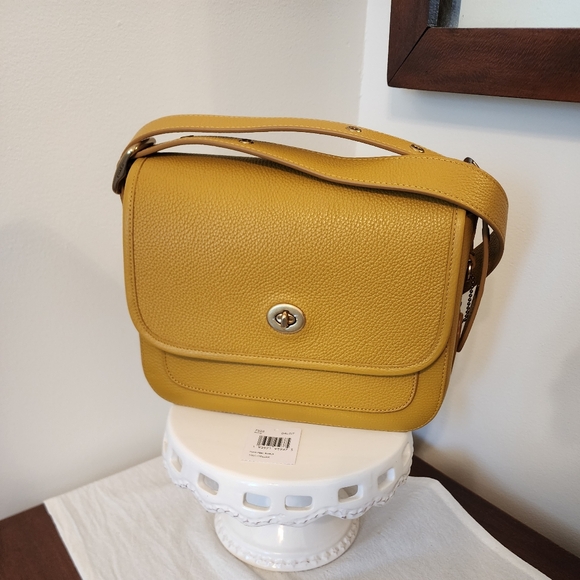 Coach Handbags - Coach Rambler Crossbody/Shoulder Bag NWT Color: Flax